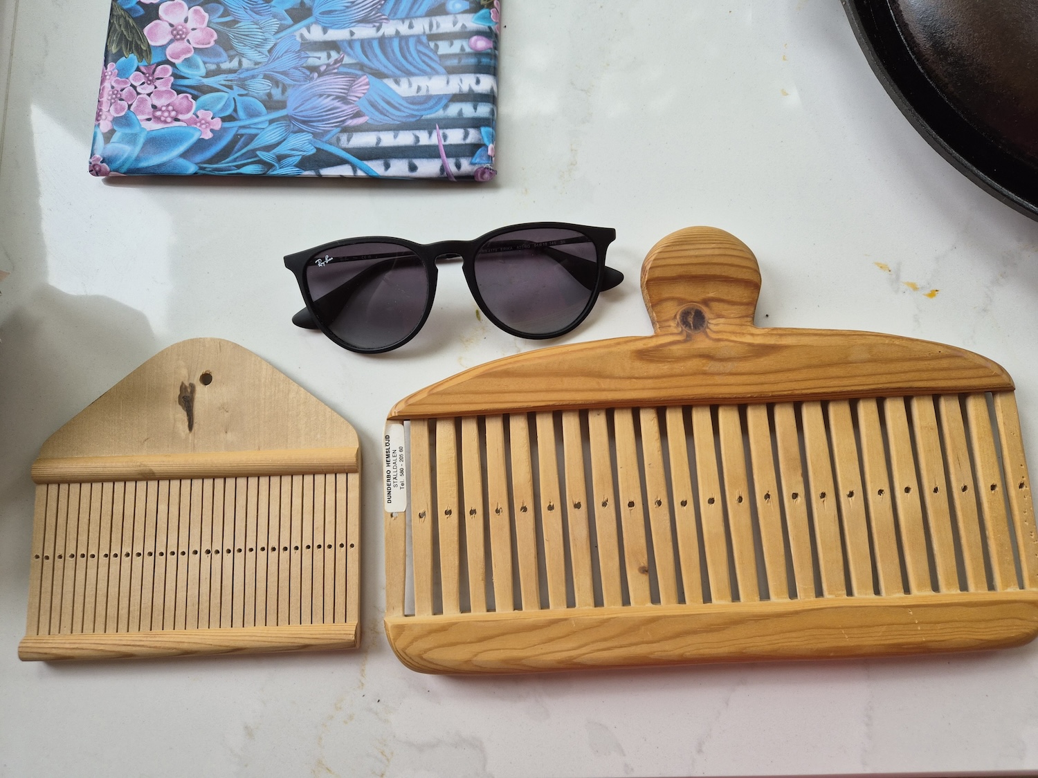 Photograph of two rigid heddles for band weaving